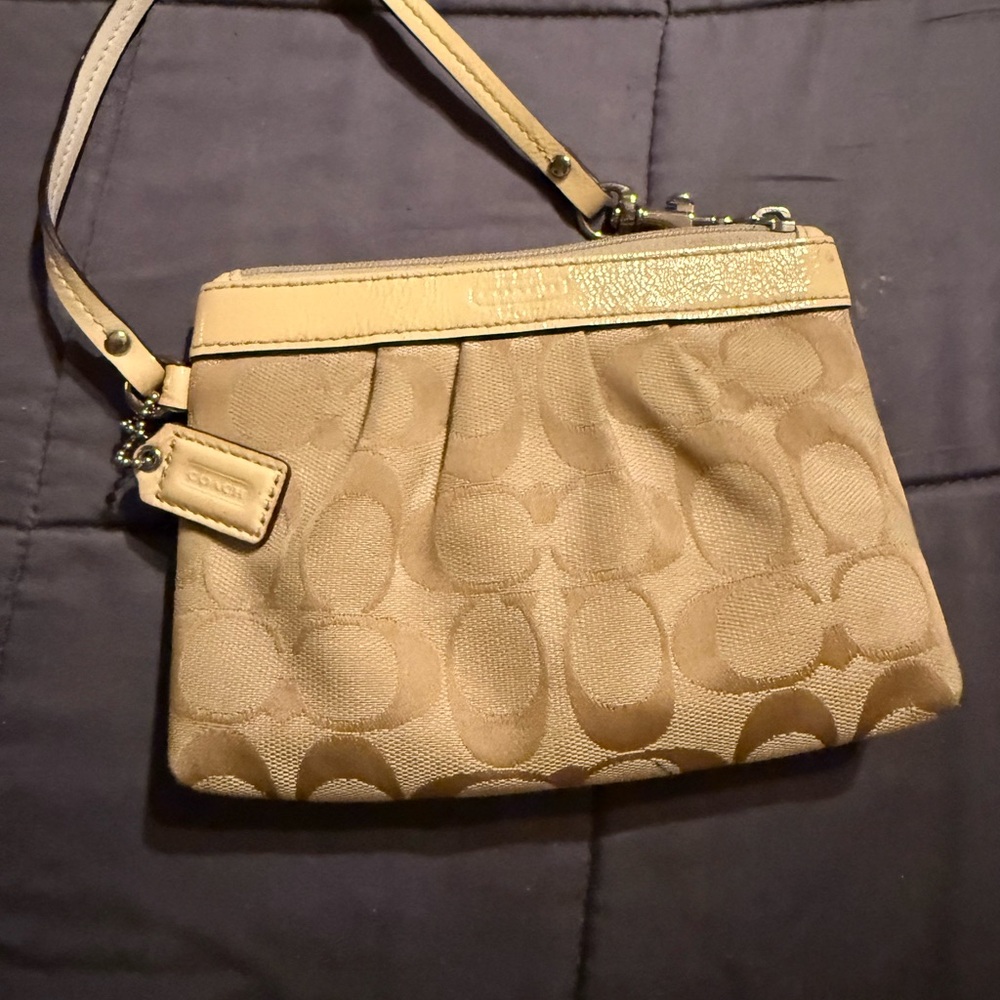 Coach Tan Clutch with Signature Monogram